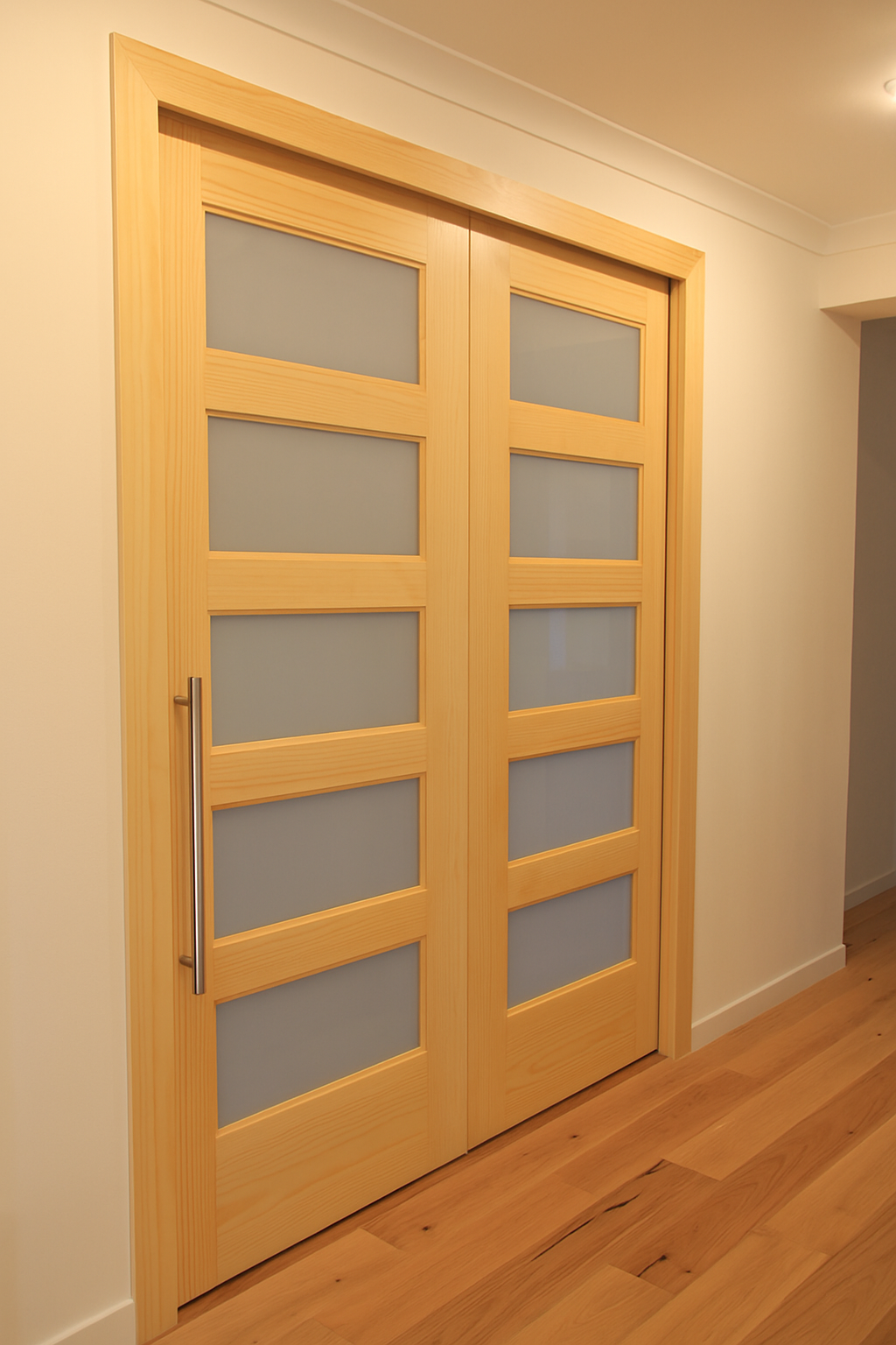 Porte coulissante en bois sur mesure